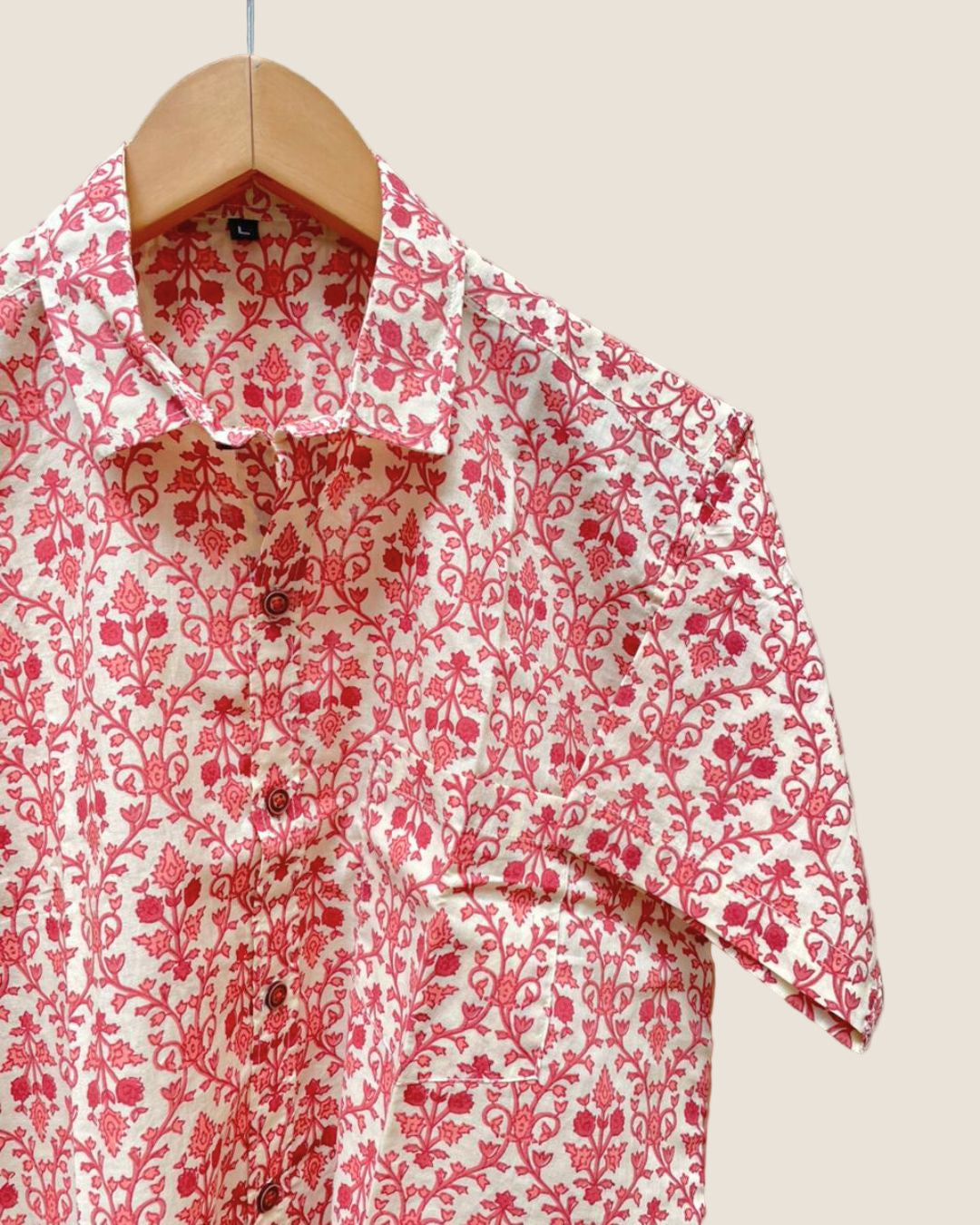 Pink floral on off white base shirt