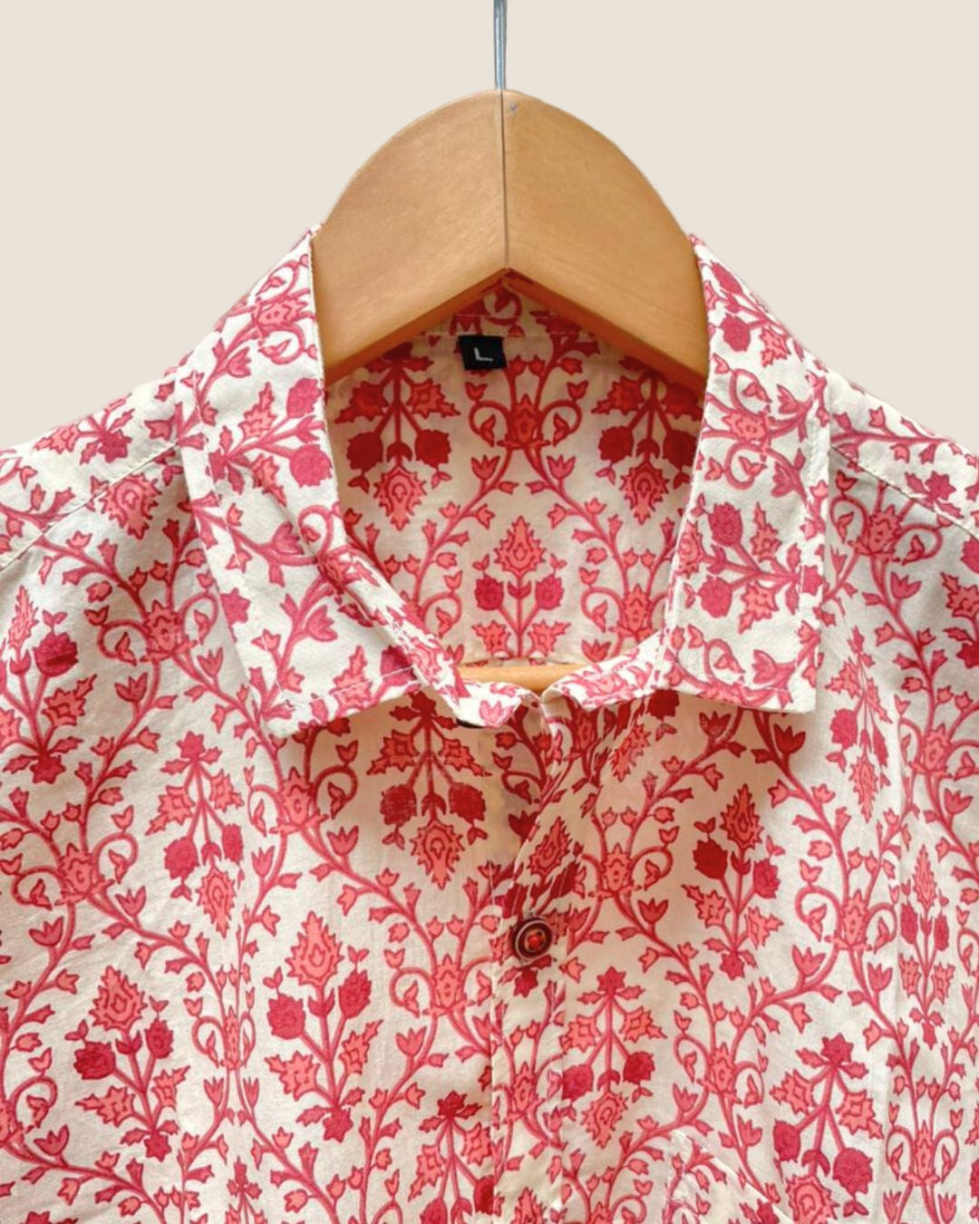 Pink floral on off white base shirt