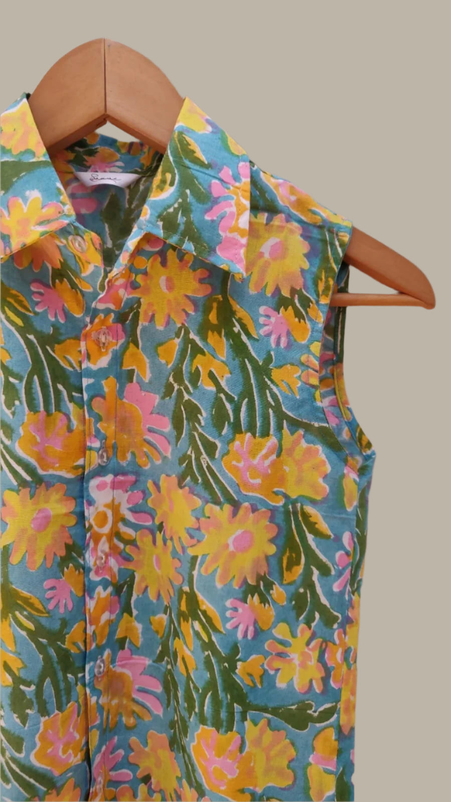 Sleeveless green floral top